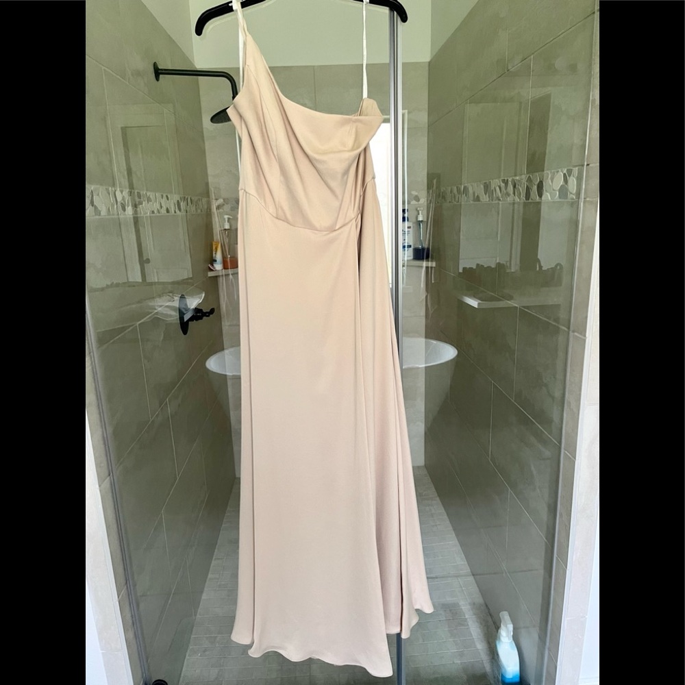 Champagne bridesmaid dress with a slit.